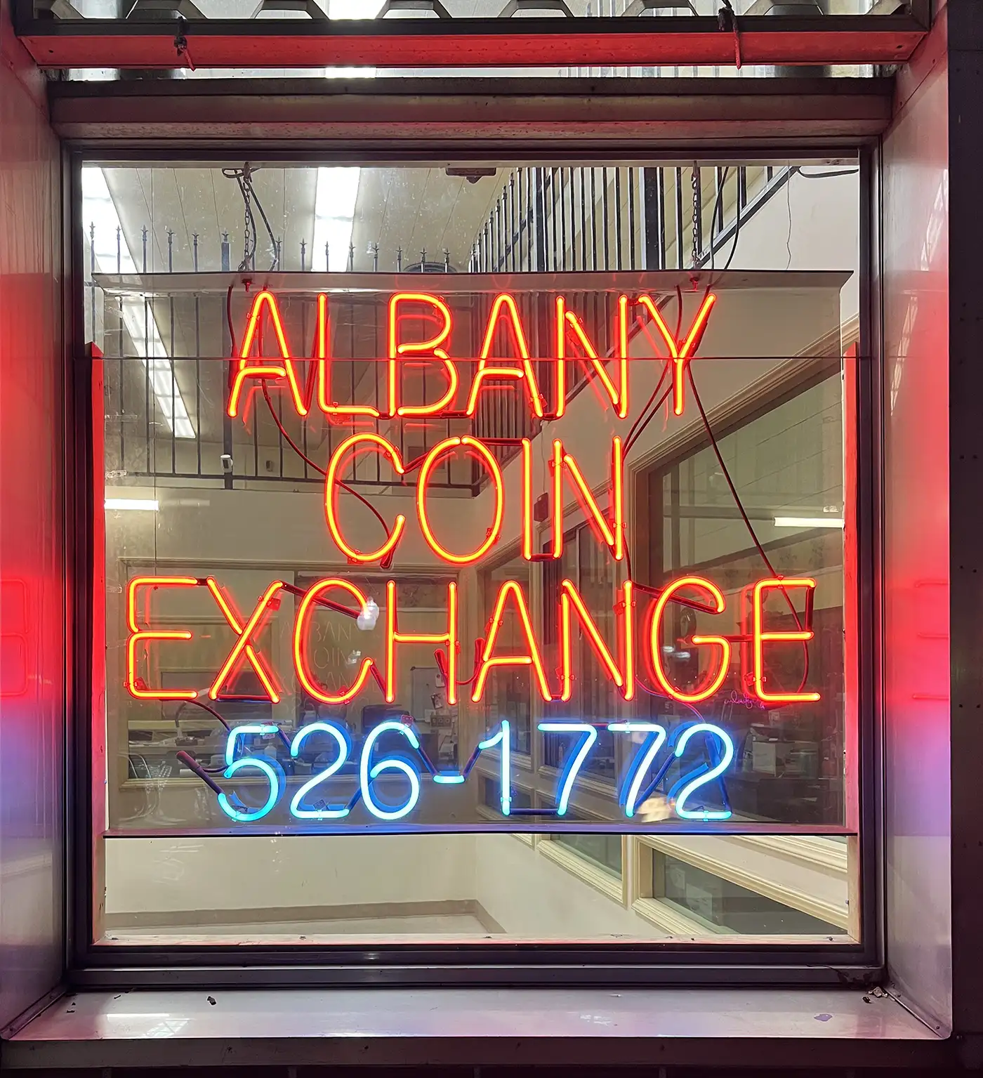 Albany Coin Exchance Neon Sign including the phone number, 1-510-526-1772